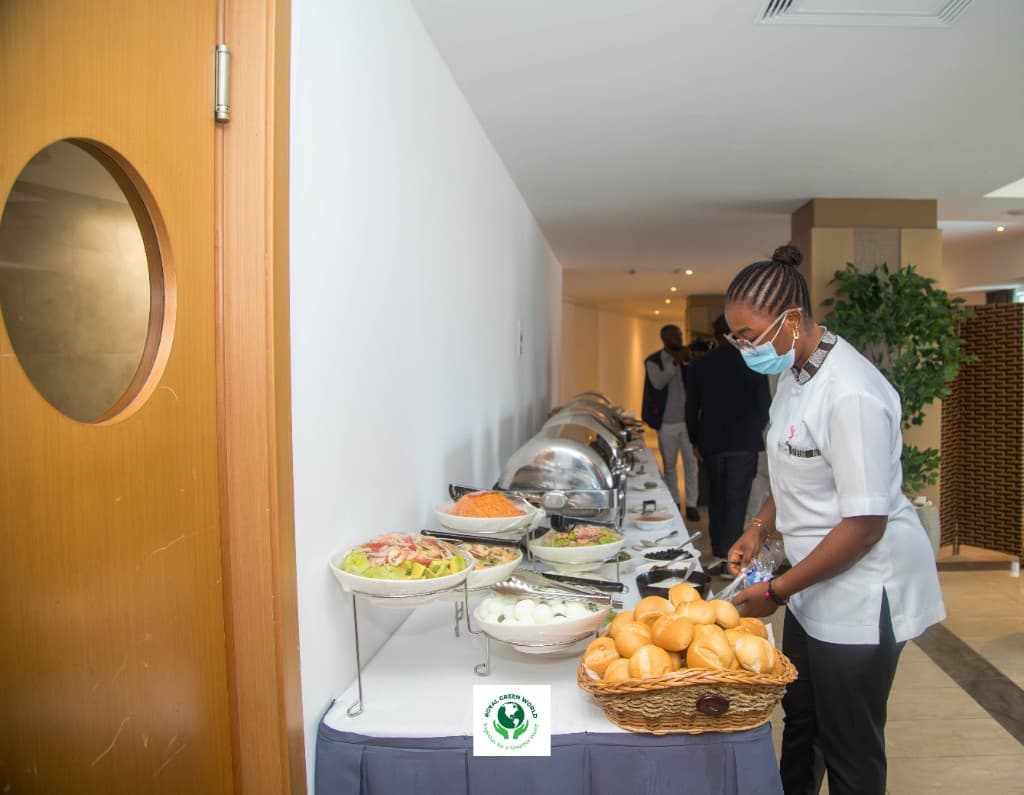 A catering table of bread, salads and covered dishes during the summit
