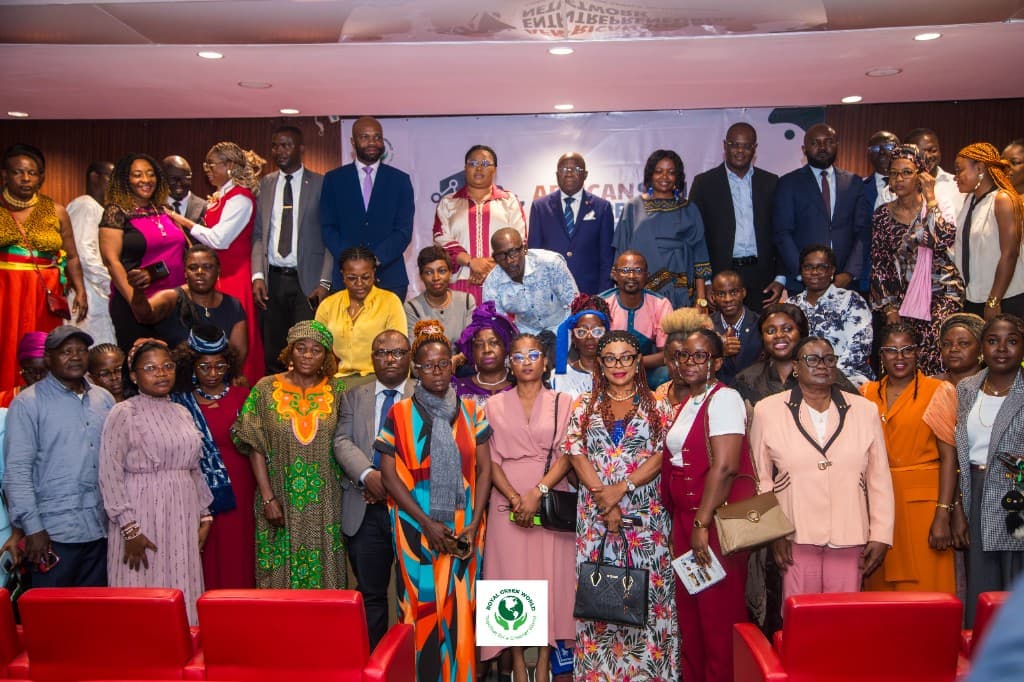 Group portrait of participants in front of the African Social Entrepreneurial Network banner